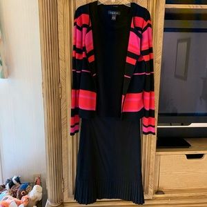 Beautiful Black pencil skirt with fun pleated hem